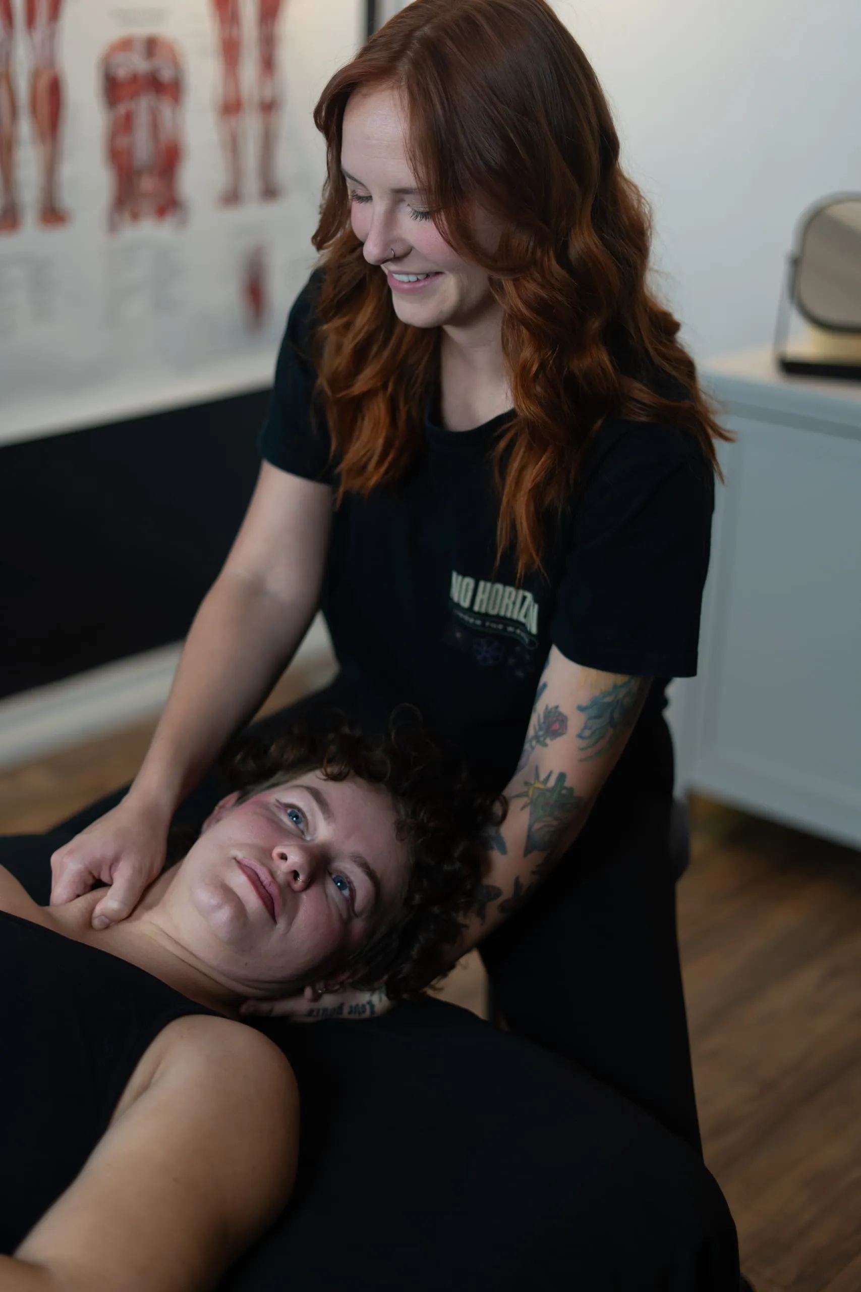 Isabelle smiling as she works with a client